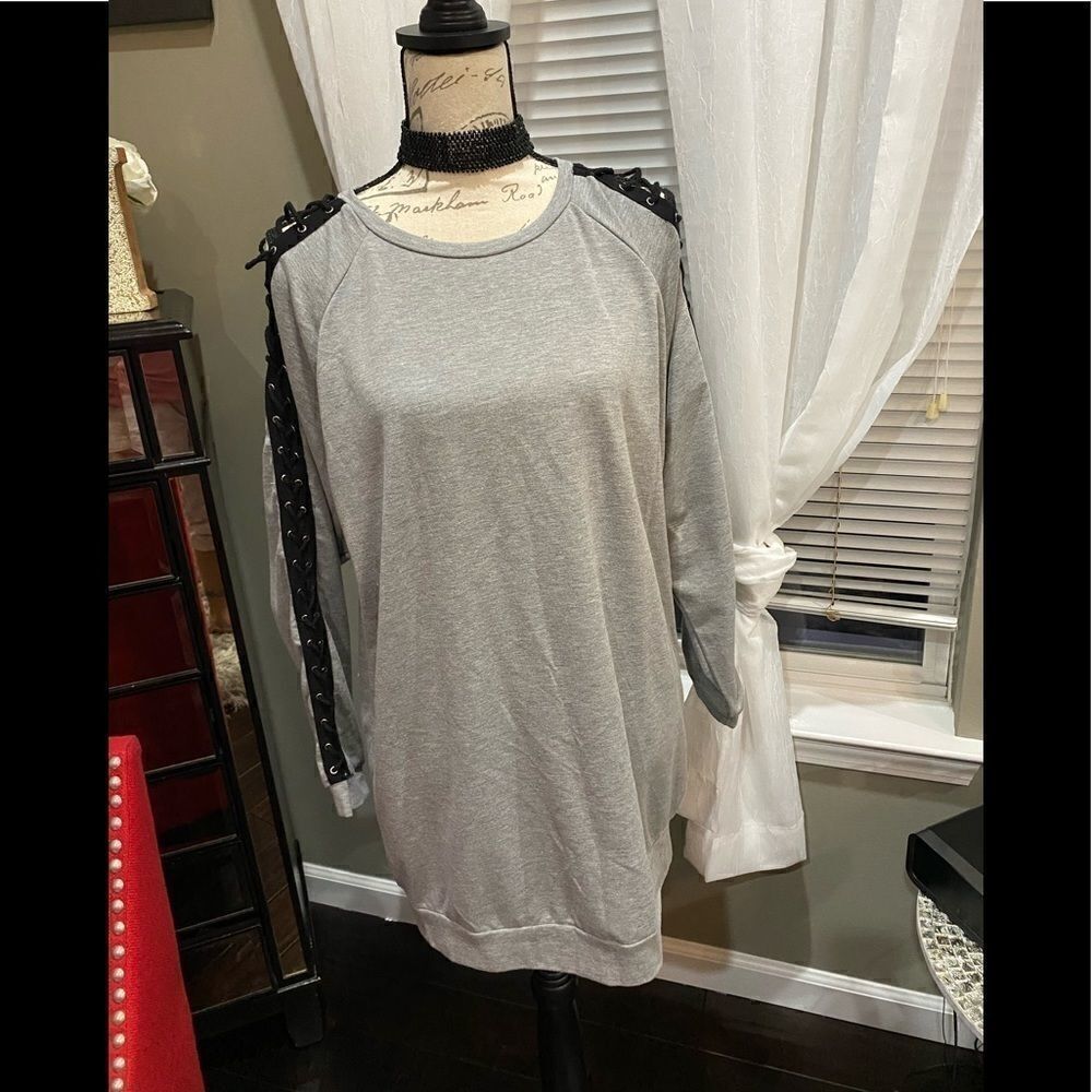 Gray sweater with black string sleeves